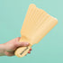 Hand holding multiple Berodin Large Plastic Spatulas